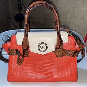 Orange, white, and brown Michael Kors purse